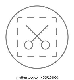 Tijeras con icono de línea de líneas punteadas.
