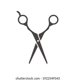 Scissors glyph icon. Haircutting shears. Cutting instrument with finger brace, tang. Hairdressing instrument. Professional hairstyling. Silhouette symbol. Negative space. Vector isolated illustration
