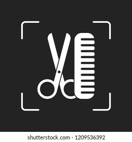 Scissors and hairbrush. Tools of barber. White object in camera autofocus on dark background