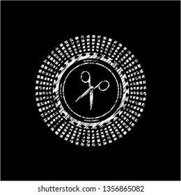 scissors icon drawn on blackboard