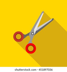 Scissors icon in flat style on a yellow background