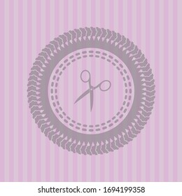 scissors icon inside badge with pink background