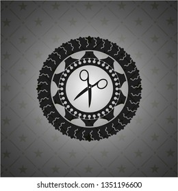 scissors icon inside black badge
