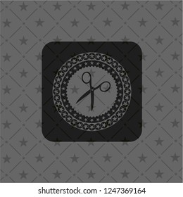 scissors icon inside black emblem