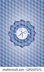 scissors icon inside blue emblem or badge with abstract geometric pattern background.
