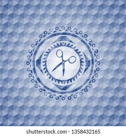 scissors icon inside blue emblem with geometric pattern.