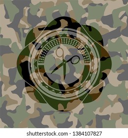 scissors icon inside camouflage emblem