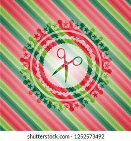 scissors icon inside christmas badge background.