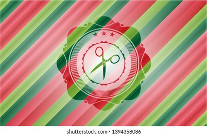 scissors icon inside christmas badge.