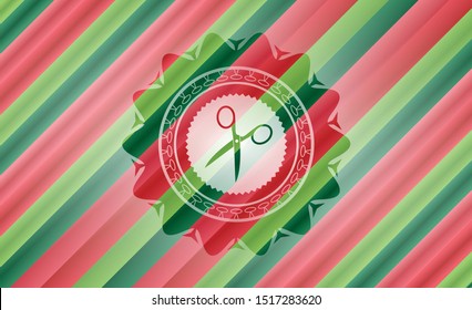 scissors icon inside christmas colors style badge.