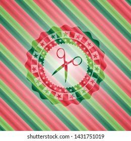 scissors icon inside christmas style badge..