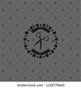 scissors icon inside dark badge or emblem