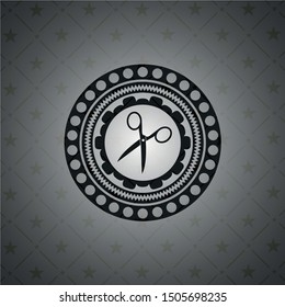 scissors icon inside dark emblem