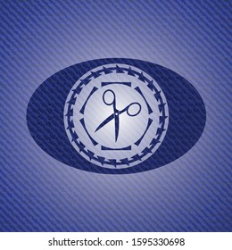 scissors icon inside emblem with jean texture