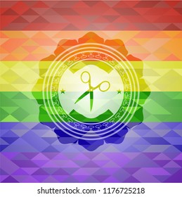 scissors icon inside emblem on mosaic background with the colors of the LGBT flag