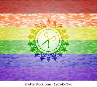 scissors icon inside emblem on mosaic background with the colors of the LGBT flag