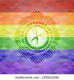 scissors icon inside emblem on mosaic background with the colors of the LGBT flag