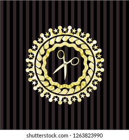 scissors icon inside gold emblem