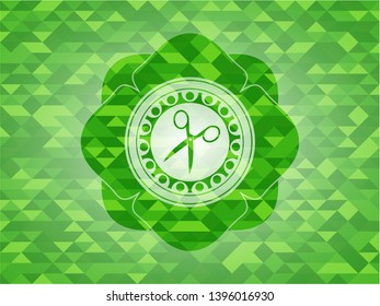 scissors icon inside green emblem with mosaic ecological style background