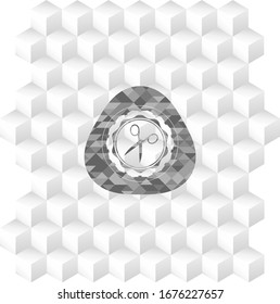 scissors icon inside grey badge with geometric cube white background