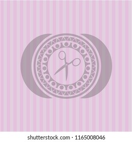 scissors icon inside pink icon or emblem