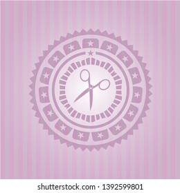 scissors icon inside pink emblem