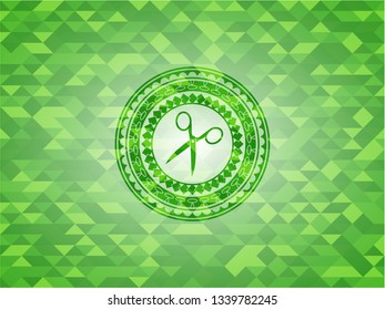 scissors icon inside realistic green emblem. Mosaic background