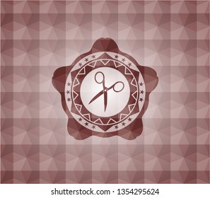 scissors icon inside red seamless emblem with geometric pattern background.