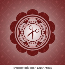 scissors icon inside retro red emblem