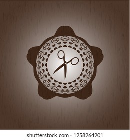scissors icon inside retro wooden emblem