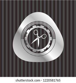 scissors icon inside silver badge or emblem