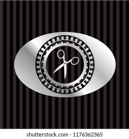 scissors icon inside silver shiny badge