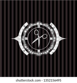 scissors icon inside silvery badge or emblem