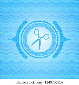 scissors icon inside sky blue water wave style emblem.