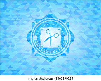 scissors icon inside sky blue mosaic emblem