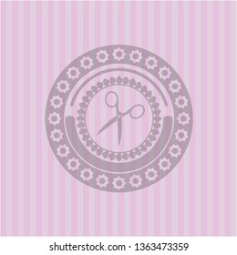 scissors icon inside vintage pink emblem