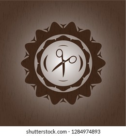 scissors icon inside wood emblem. Vintage.