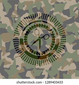 scissors icon on camo pattern