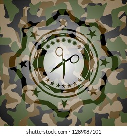 scissors icon on camo texture