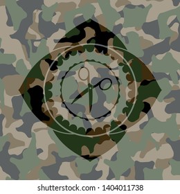 scissors icon on camouflage pattern