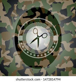 scissors icon on camouflage pattern