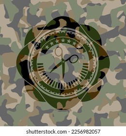 scissors icon on camouflage texture. 