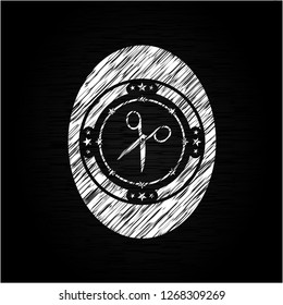 scissors icon on chalkboard