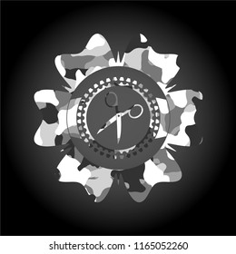 scissors icon on grey camo texture