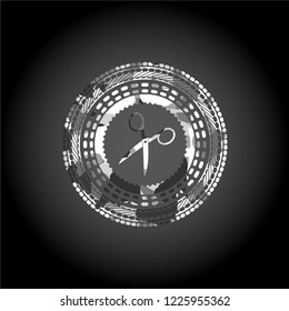 scissors icon on grey camouflaged pattern