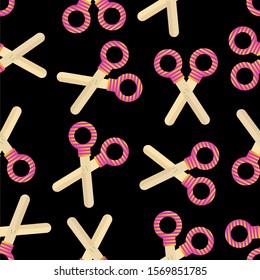 scissors on a black background. Cute seamless background.