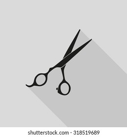 scissors on a gray background