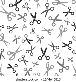 Scissors seamless pattern. Barber shop or tailor theme in vintage colors. Seamless pattern with hairdressing scissors. Sewing background and cloth design.