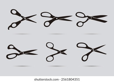 Scissors vectors. Collection of isolated scissors silhouettes.