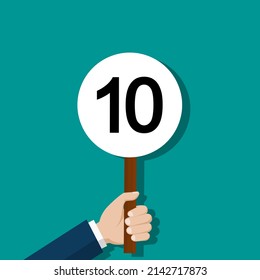 Scorecard with number 10. Score card in hand of jury. Hand holding card with number 10. Vote of judge. Committee for contest, competition and grade. Vector.